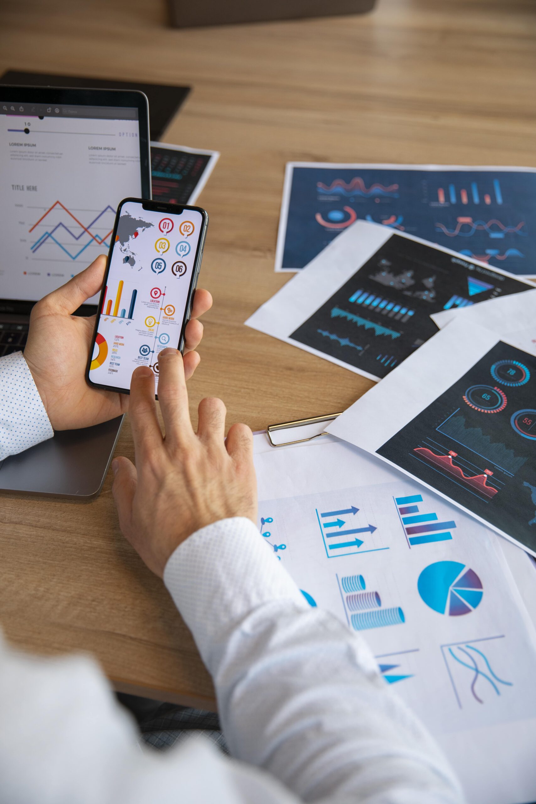 office-workers-using-finance-graphs-min